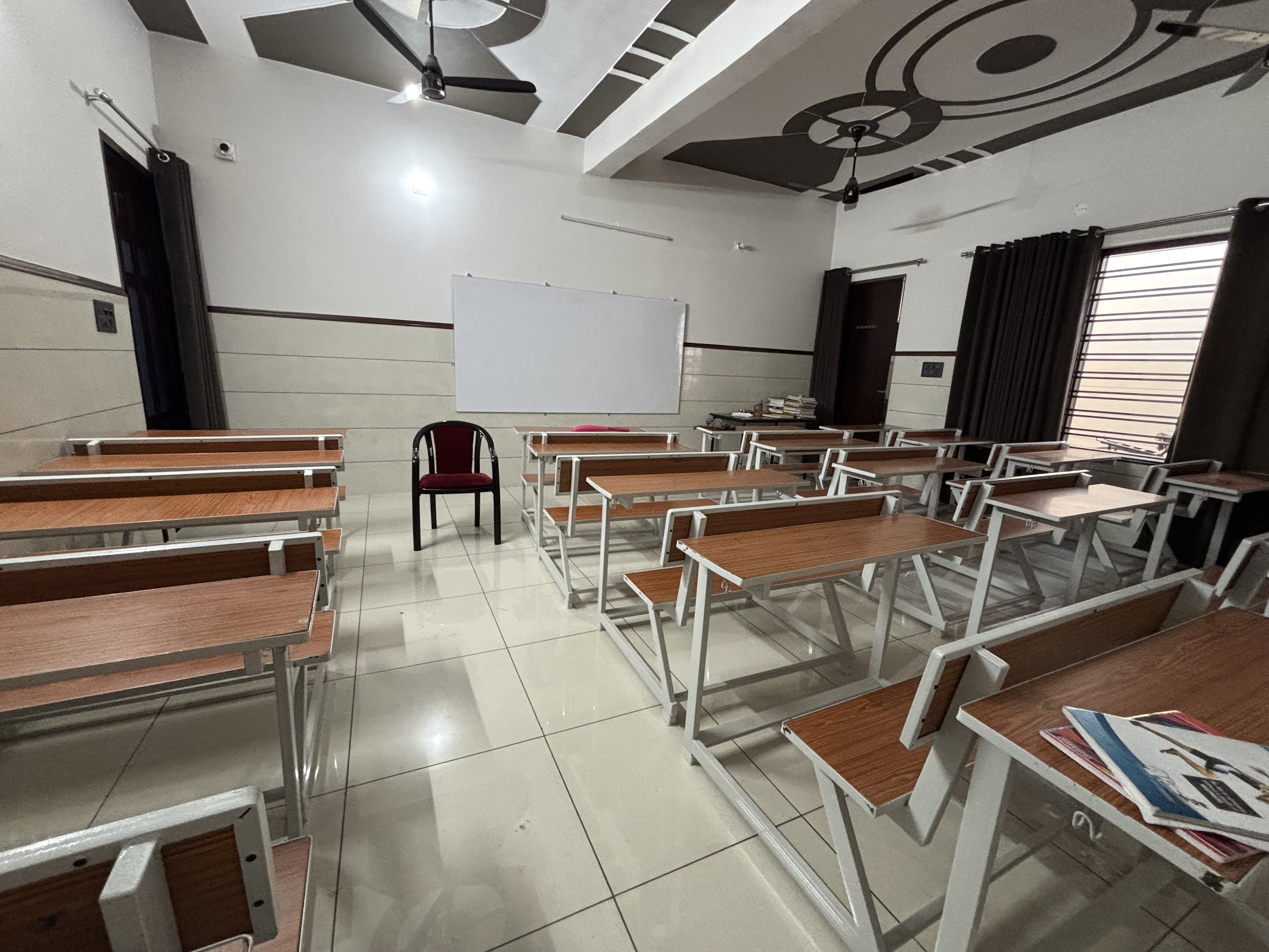 Modern classroom at Ankur Coaching Classes with spacious seating